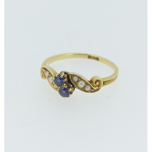 284 - A small early 20thC sapphire and seed pearl Ring, all mounted in 18ct yellow gold, Size P, approx. t... 