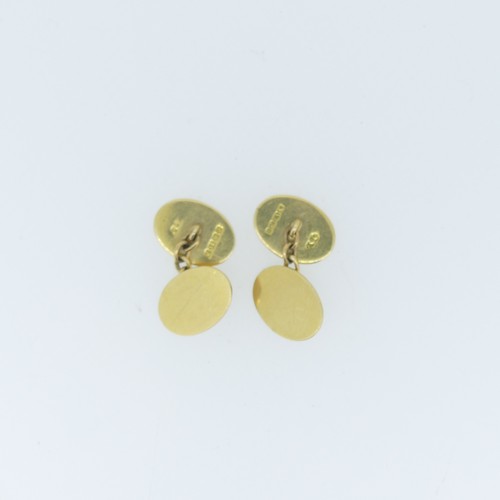 492 - A pair of 18ct yellow gold Cufflinks, of plain oval form with chain between, 13g.