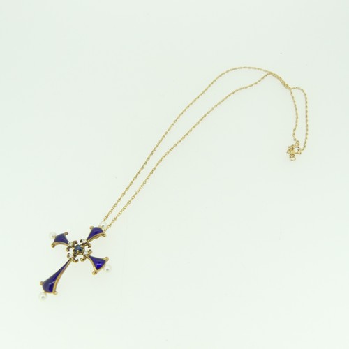 353 - A 'Midnight Sapphire Cross' from The House of Igor Carl Faberge, for Franklin Mint, the blue enamel ... 