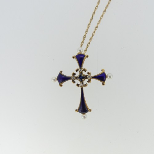 353 - A 'Midnight Sapphire Cross' from The House of Igor Carl Faberge, for Franklin Mint, the blue enamel ... 