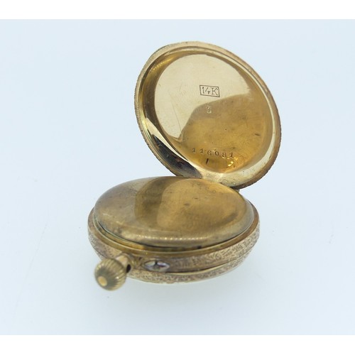 212 - A 14ct gold Fob Watch, the gilt dial with foliate decoration and Roman Numerals, gilt metal cuvette,... 