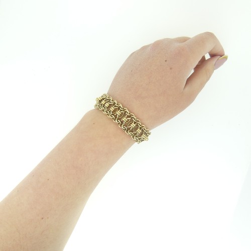 413 - A 9ct gold Bracelet, formed of open flexible ropemesh links, integral clasp, 20cm long, 37.6g.... 