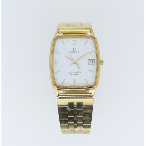 229 - An Omega gold-plated Seamaster quartz gentleman's Wristwatch, the rounded rectangular dial with Arab... 