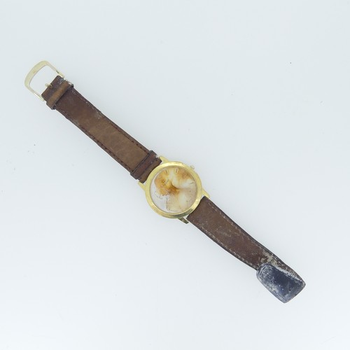 211 - An 18ct yellow gold Eterna 1856 quartz bracelet Watch, model no. 3100.68, on brown leather strap, in... 