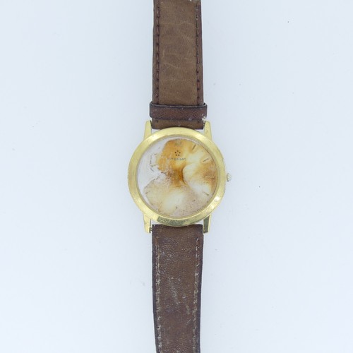 211 - An 18ct yellow gold Eterna 1856 quartz bracelet Watch, model no. 3100.68, on brown leather strap, in... 