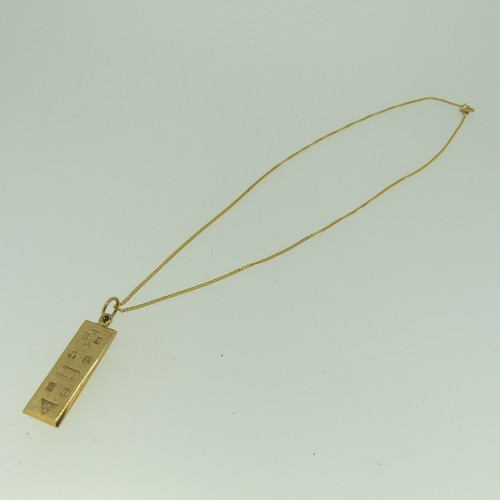 365 - A 9ct gold Ingot Pendant, 3.8cm long inc. suspension loop, on a 9ct gold trace chain, approx total w... 