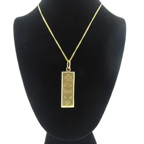 365 - A 9ct gold Ingot Pendant, 3.8cm long inc. suspension loop, on a 9ct gold trace chain, approx total w... 