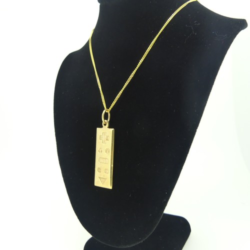 365 - A 9ct gold Ingot Pendant, 3.8cm long inc. suspension loop, on a 9ct gold trace chain, approx total w... 