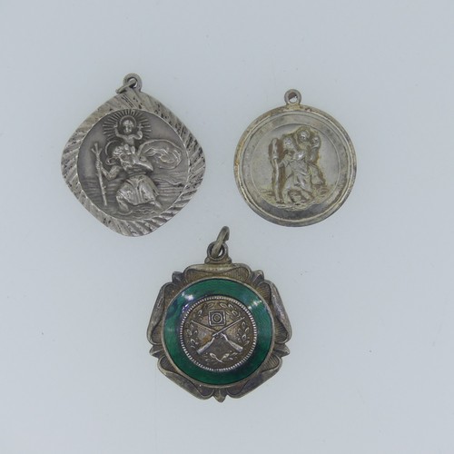 488 - Two silver St. Christopher Pendants, together with a quantity of silver fobs, a damaged ingot pendan... 