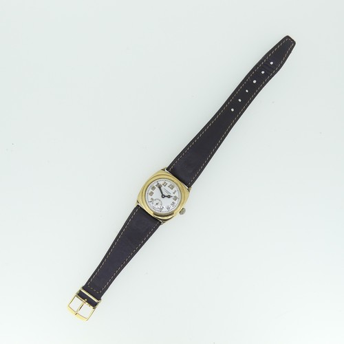 205A - A 1930's Benson 9ct gold gentleman's Wristwatch, with Swiss movement, the cushion-shaped case with c... 