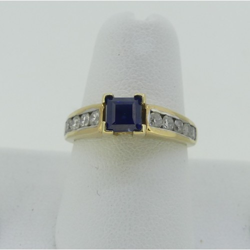 334 - A sapphire and diamond Ring, the central square sapphire 4.65mm wide, with five brilliant cut diamon... 