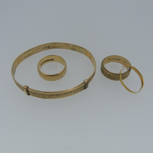 490 - A 9ct textured gold Band, Size R, together with a plain 9ct gold band, Size R½, 12.1g, a dama... 