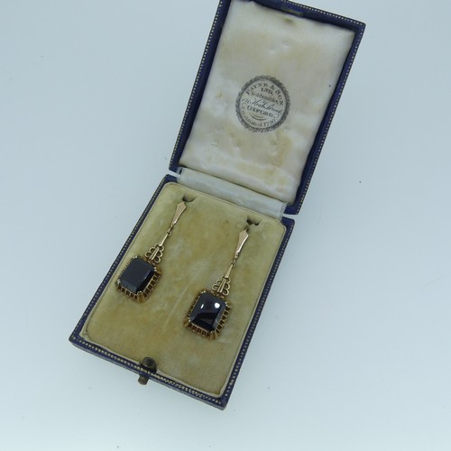 502 - A pair of 9ct gold mounted garnet Earrings, together with a 9ct gold bar brooch, the centre with ova... 