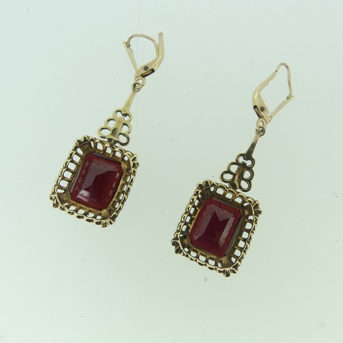 502 - A pair of 9ct gold mounted garnet Earrings, together with a 9ct gold bar brooch, the centre with ova... 