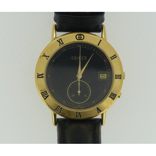 230 - A Gucci gold-plated Wristwatch, with sixteen jewels quartz movement, together with three other wrist... 