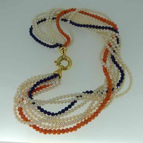 385 - A multi-strand cultured pearl, lapis lazuli and coral Necklace, formed of six rows of cultured pearl... 