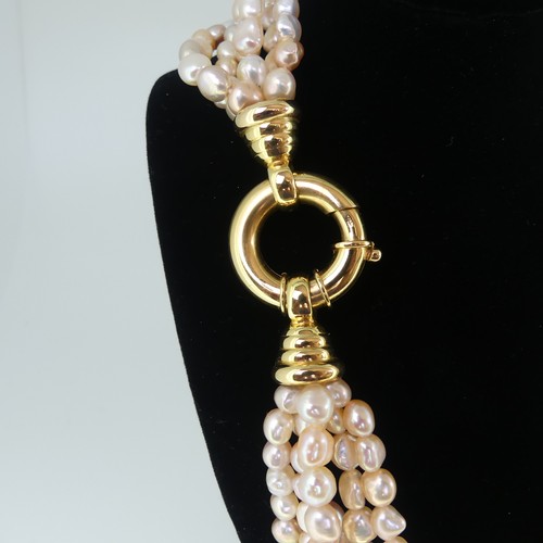 368 - A multistrand freshwater pearl Necklace, formed of six rows of pearls approx. 6-8mm long, with pink ... 