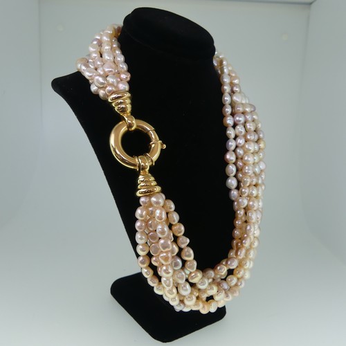 368 - A multistrand freshwater pearl Necklace, formed of six rows of pearls approx. 6-8mm long, with pink ... 