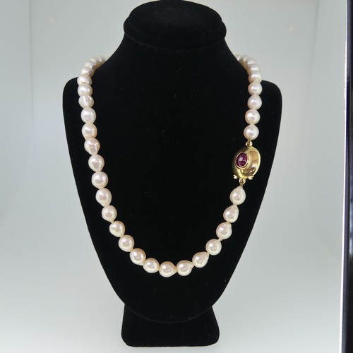 370 - A single row of baroque cultured Pearls, formed of 45 pearls, approx 8-9mm long, the 18ct gold snap ... 