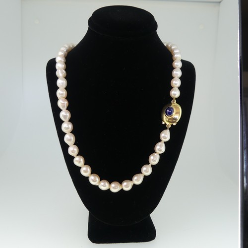 370 - A single row of baroque cultured Pearls, formed of 45 pearls, approx 8-9mm long, the 18ct gold snap ... 