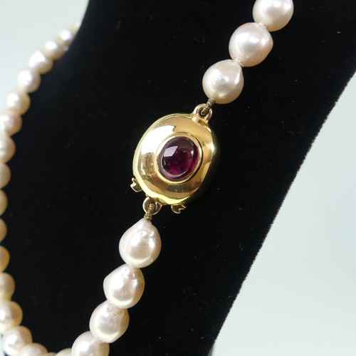 370 - A single row of baroque cultured Pearls, formed of 45 pearls, approx 8-9mm long, the 18ct gold snap ... 