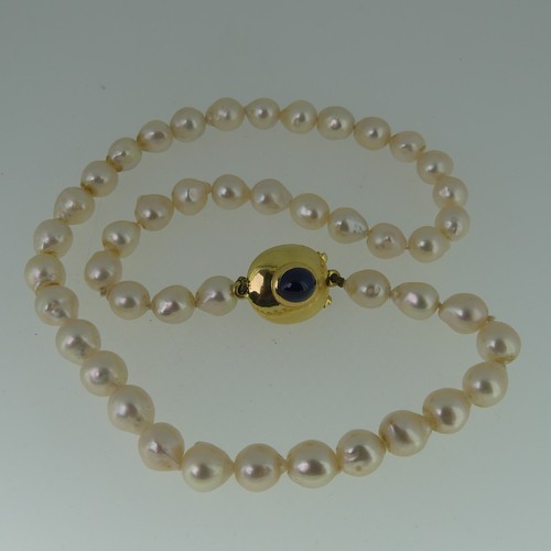 370 - A single row of baroque cultured Pearls, formed of 45 pearls, approx 8-9mm long, the 18ct gold snap ... 