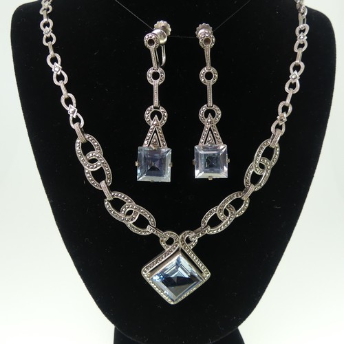 457 - A vintage German silver, blue paste and marcasite Necklace and Earring Suite, the necklace 42cm long... 