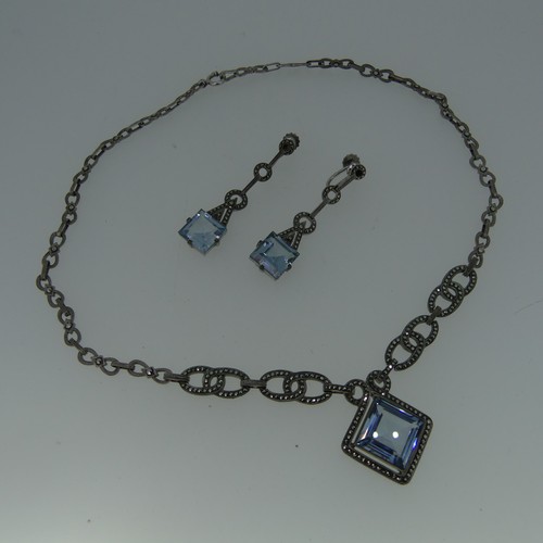 457 - A vintage German silver, blue paste and marcasite Necklace and Earring Suite, the necklace 42cm long... 