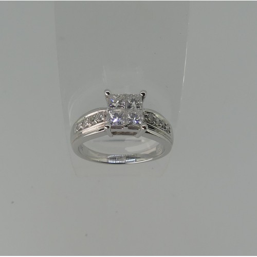 274 - An 18ct white gold diamond Ring, the square front formed of four princess stones, each approx 0.2ct ... 