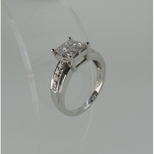 274 - An 18ct white gold diamond Ring, the square front formed of four princess stones, each approx 0.2ct ... 