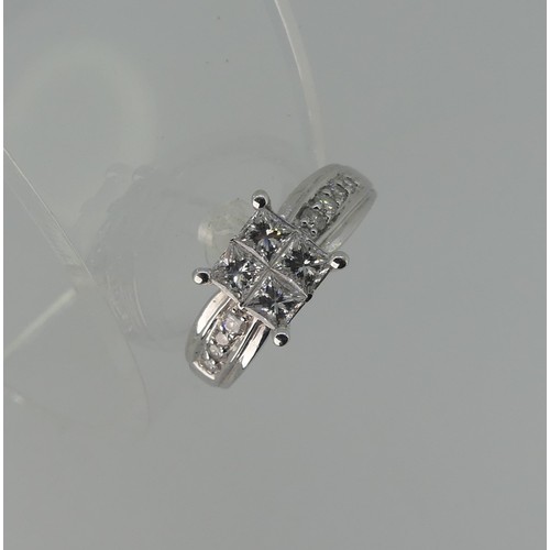 274 - An 18ct white gold diamond Ring, the square front formed of four princess stones, each approx 0.2ct ... 