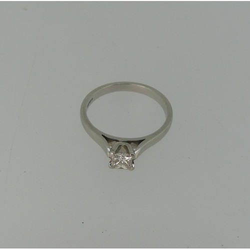 313 - A single stone diamond Ring, the princess cut stone approx. 0.4ct, four claw set in platinum, Size M... 