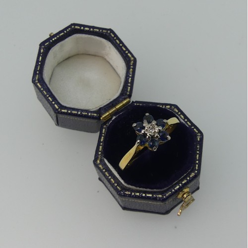 344 - A small sapphire and diamond cluster Ring, all mounted in 18ct yellow gold, Size N½, 2.6g.... 