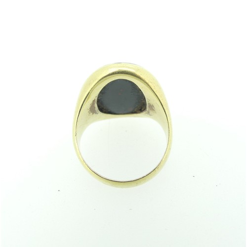 314 - A 14ct gold and bloodstone Signet Ring, the oval matrix crested, the shank marked 585 and tested, Si... 