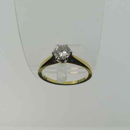 320 - A diamond solitaire Ring, the brilliant cut stone approx. 0.58ct six claw set in 18ct yellow and whi... 