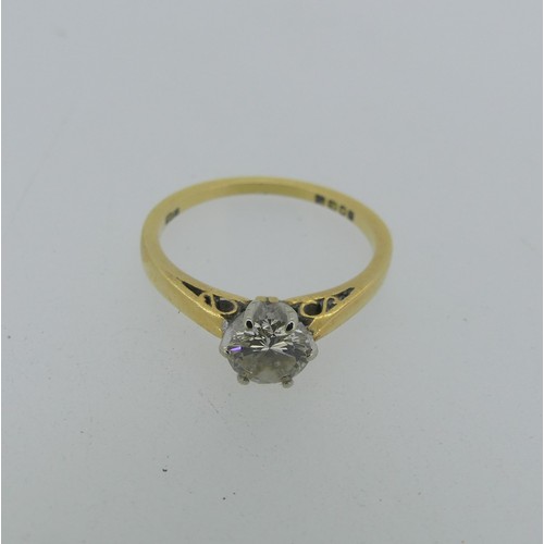 320 - A diamond solitaire Ring, the brilliant cut stone approx. 0.58ct six claw set in 18ct yellow and whi... 