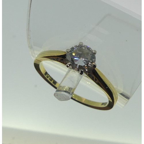 320 - A diamond solitaire Ring, the brilliant cut stone approx. 0.58ct six claw set in 18ct yellow and whi... 