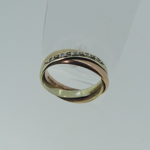 338 - A 9ct tri-colour gold Ring, the twist front set with five small diamond points, Size N, 4.4g.... 