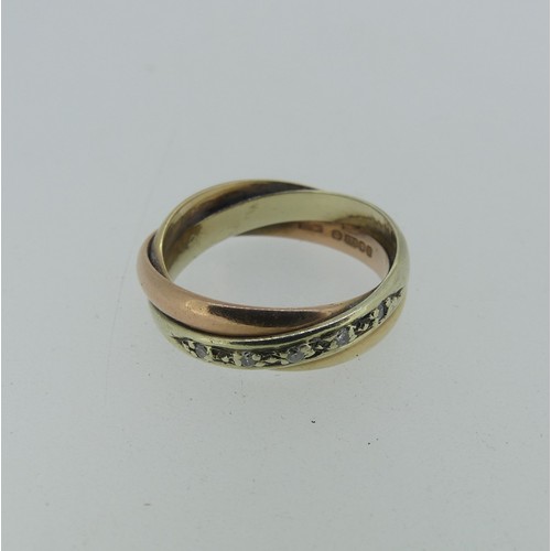 338 - A 9ct tri-colour gold Ring, the twist front set with five small diamond points, Size N, 4.4g.... 