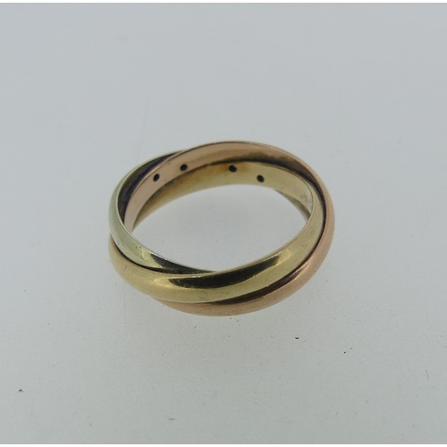 338 - A 9ct tri-colour gold Ring, the twist front set with five small diamond points, Size N, 4.4g.... 