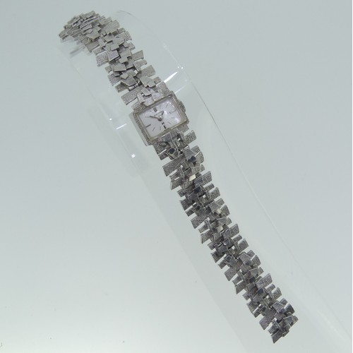 249 - An 18ct white gold lady's Hamilton Wristwatch, with 17-jewels movement, on integral 18ct white gold ... 