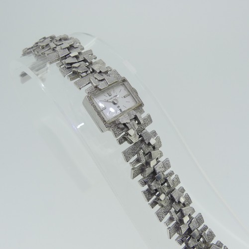 249 - An 18ct white gold lady's Hamilton Wristwatch, with 17-jewels movement, on integral 18ct white gold ... 