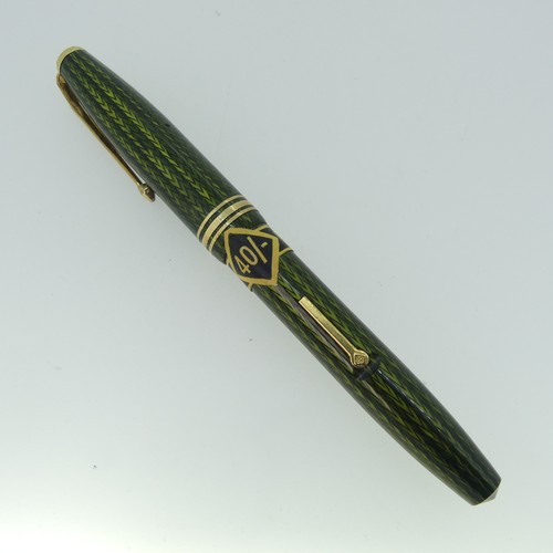 264 - Conway Stewart 77 fountain pen, green herring bone, in new unused condition with paper collar type 4... 