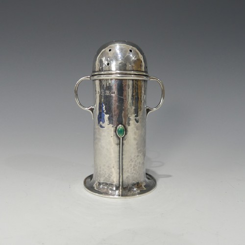 173 - A.E.Jones; An Edwardian silver Sugar Caster, hallmarked Birmingham, 1905, or lighthouse form with re... 