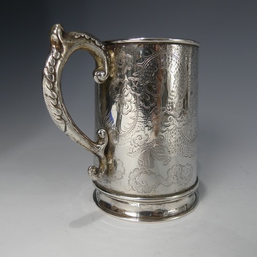 47 - A 19thC Chinese export silver Mug, by Hung Chong, of conical form with engraved scrolling dragon dec... 