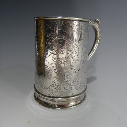 47 - A 19thC Chinese export silver Mug, by Hung Chong, of conical form with engraved scrolling dragon dec... 