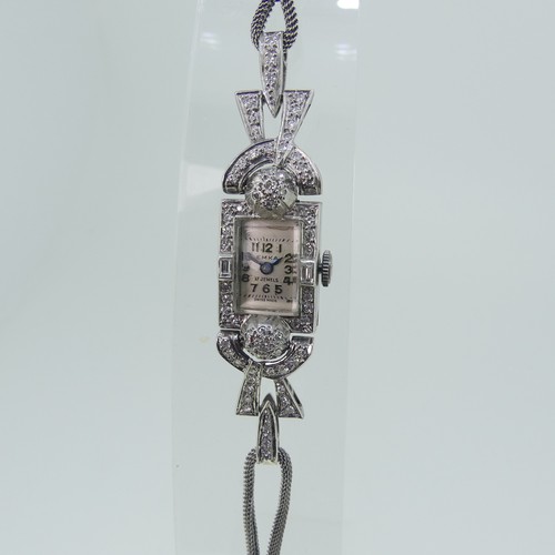 282 - An Art Deco lady's diamond Cocktail Watch, by EMKA, with Swiss 17-jewels movement, diamond set surro... 