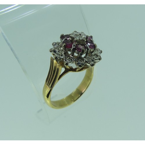 95 - A ruby and diamond cluster Dress Ring, all mounted in unmarked yellow and white gold, tested as 9ct,... 