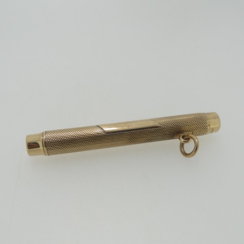 212 - Sampson Mordan; A 9ct gold Propelling Pencil, hallmarked London, 1916, the body with engine turned d... 