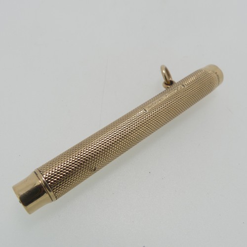 212 - Sampson Mordan; A 9ct gold Propelling Pencil, hallmarked London, 1916, the body with engine turned d... 